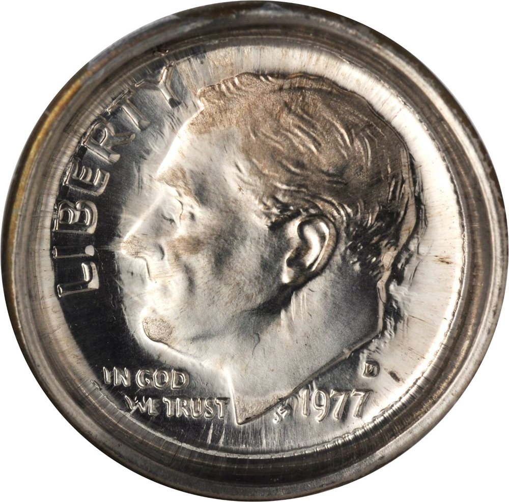 1977-D Roosevelt dime obverse die cap error showing dramatic cupped uniface deformation